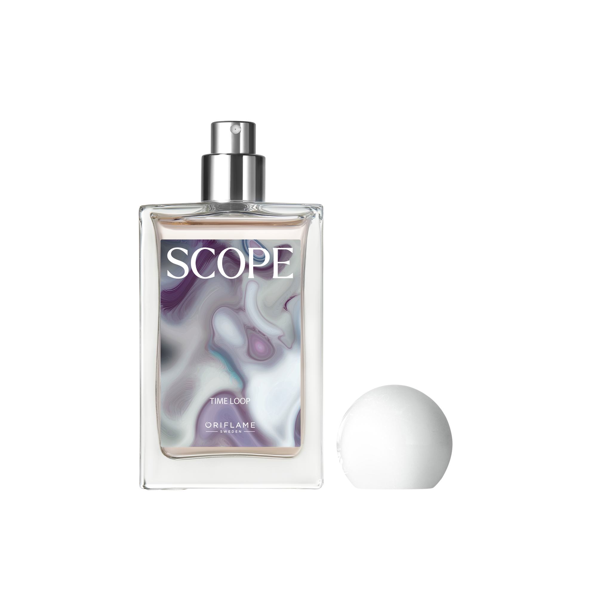 一瓶香水置于球体旁